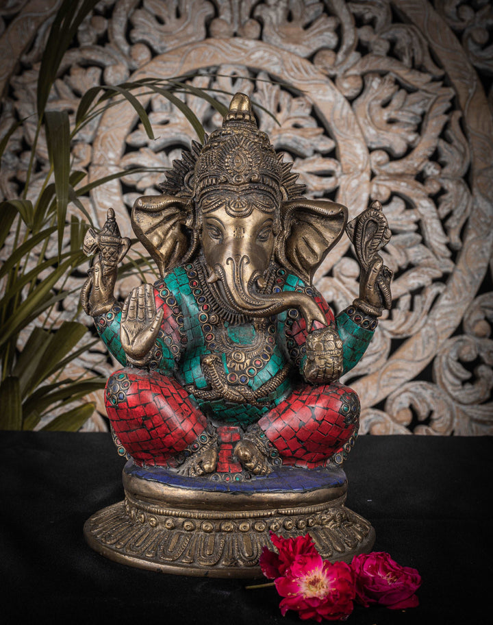 Brass Ganesha Statue with Turquoise and Coral stone work.