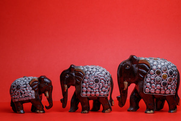 Wooden Elephant adorned with metal work